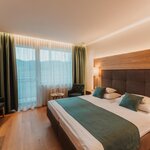 Photo of double room with bath tube